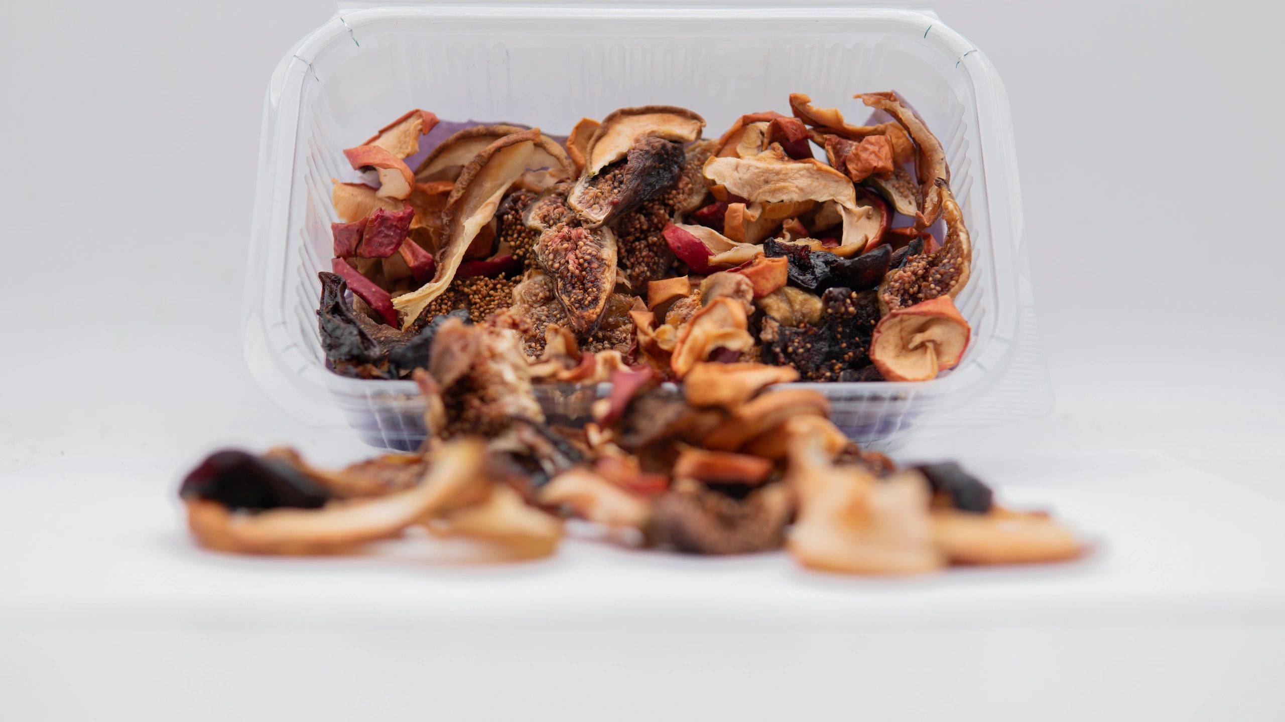 Assorted dried fruit and natural snacks in a gift-style box