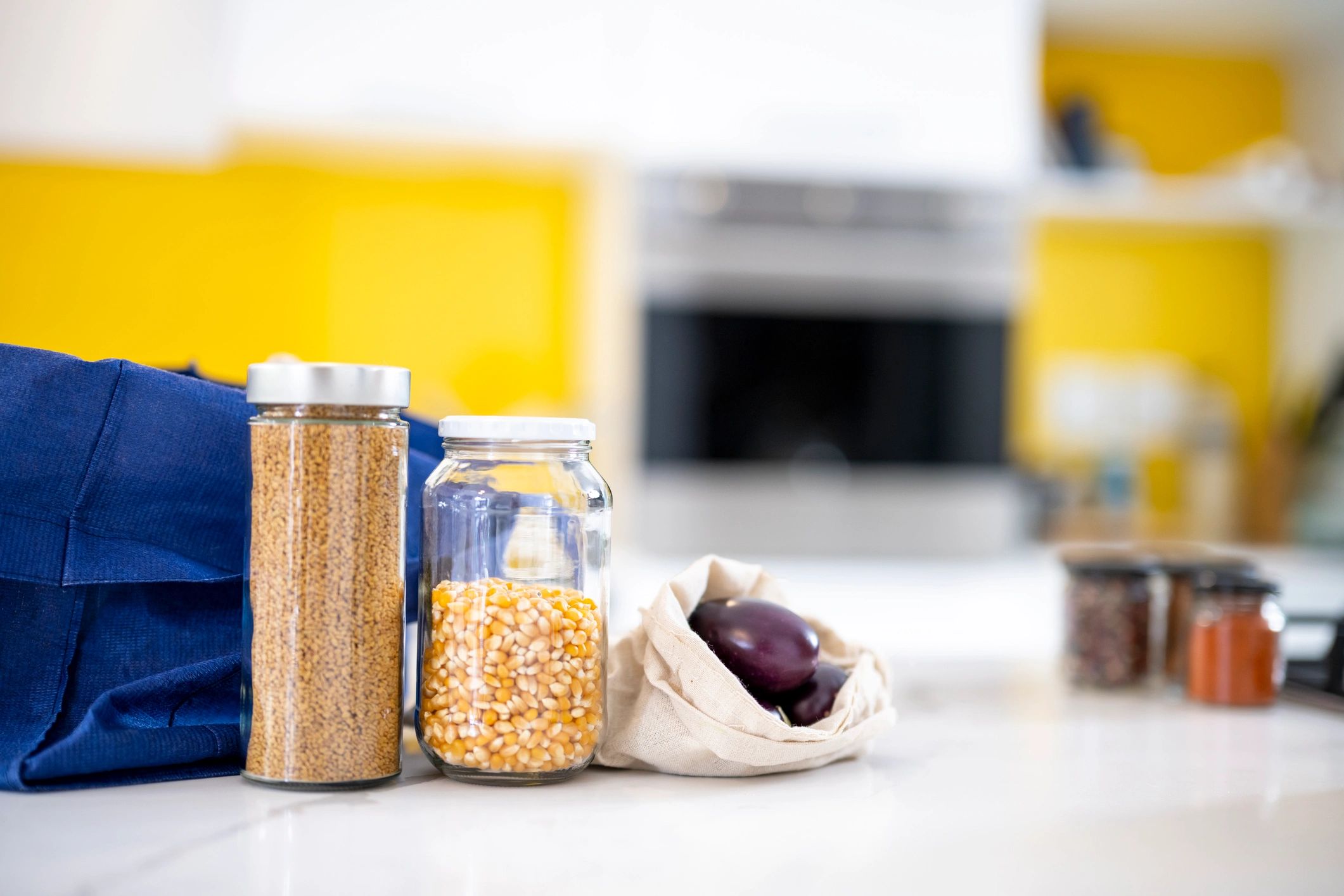 Healthy pantry flat lay with jars and natural ingredients