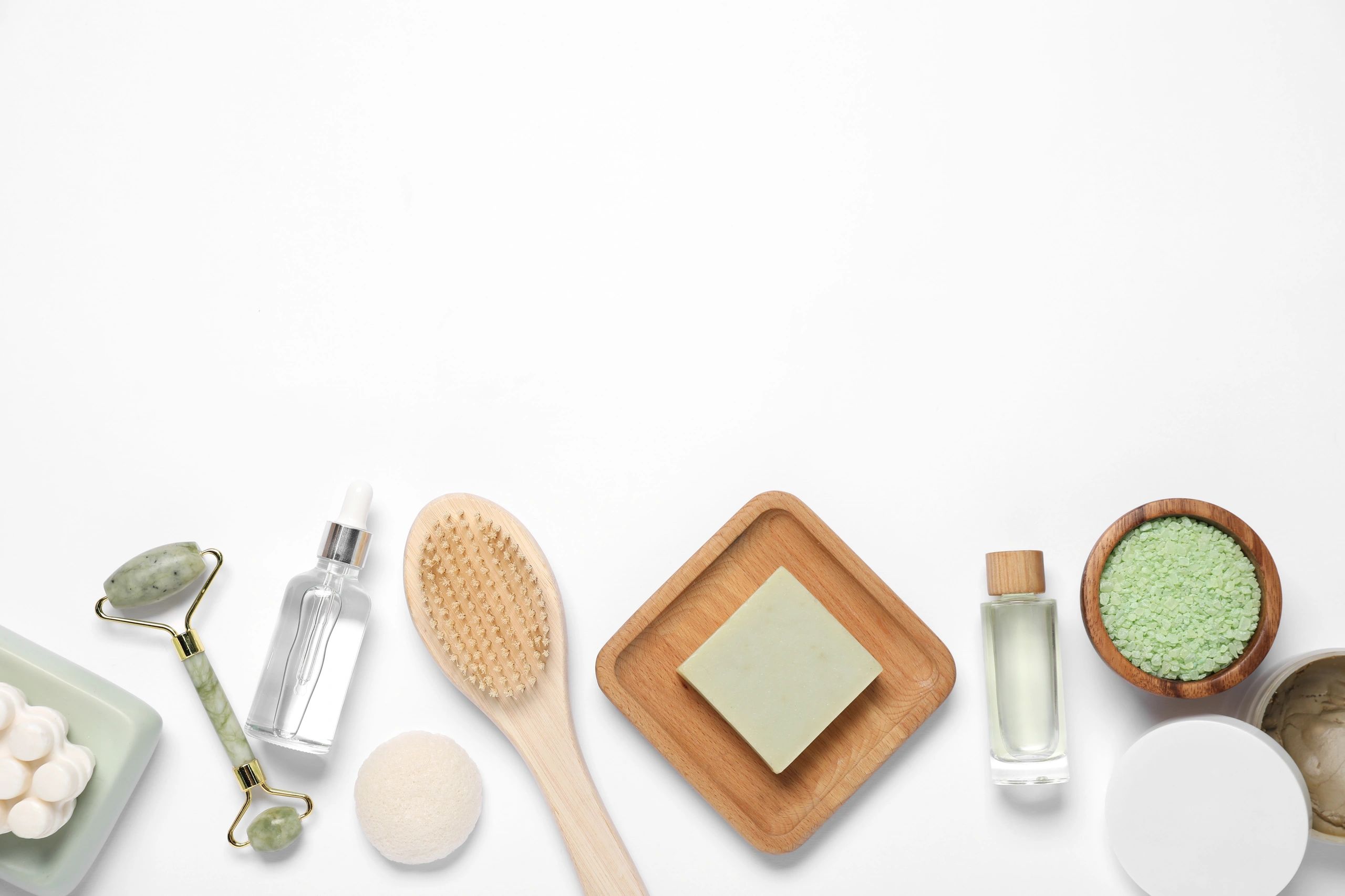Premium wellness products arranged in a refined flat lay