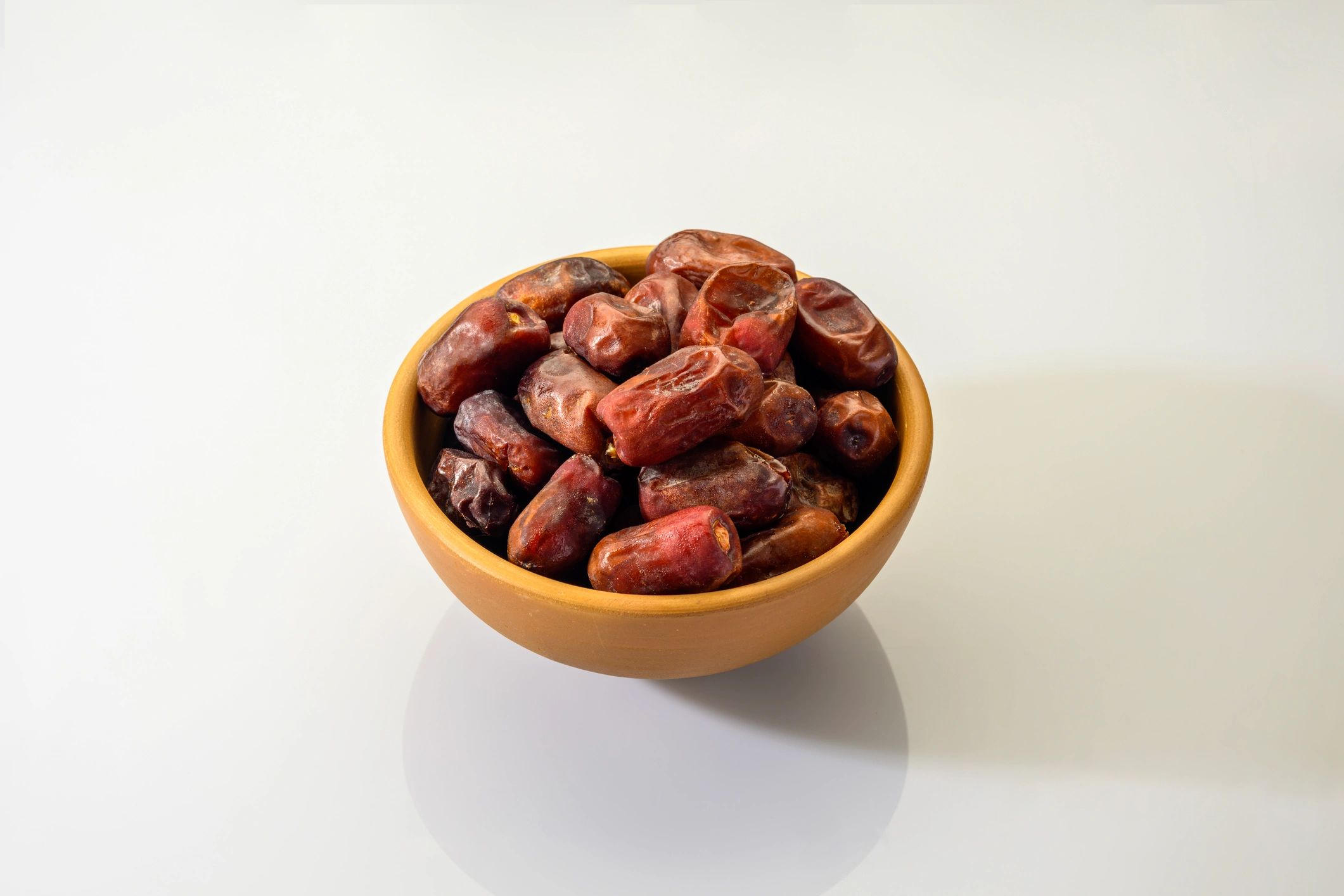 Premium dates in an earthen bowl